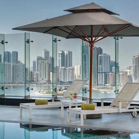 The Act Hotel Sharjah Exterior photo The Address Downtown Dubai