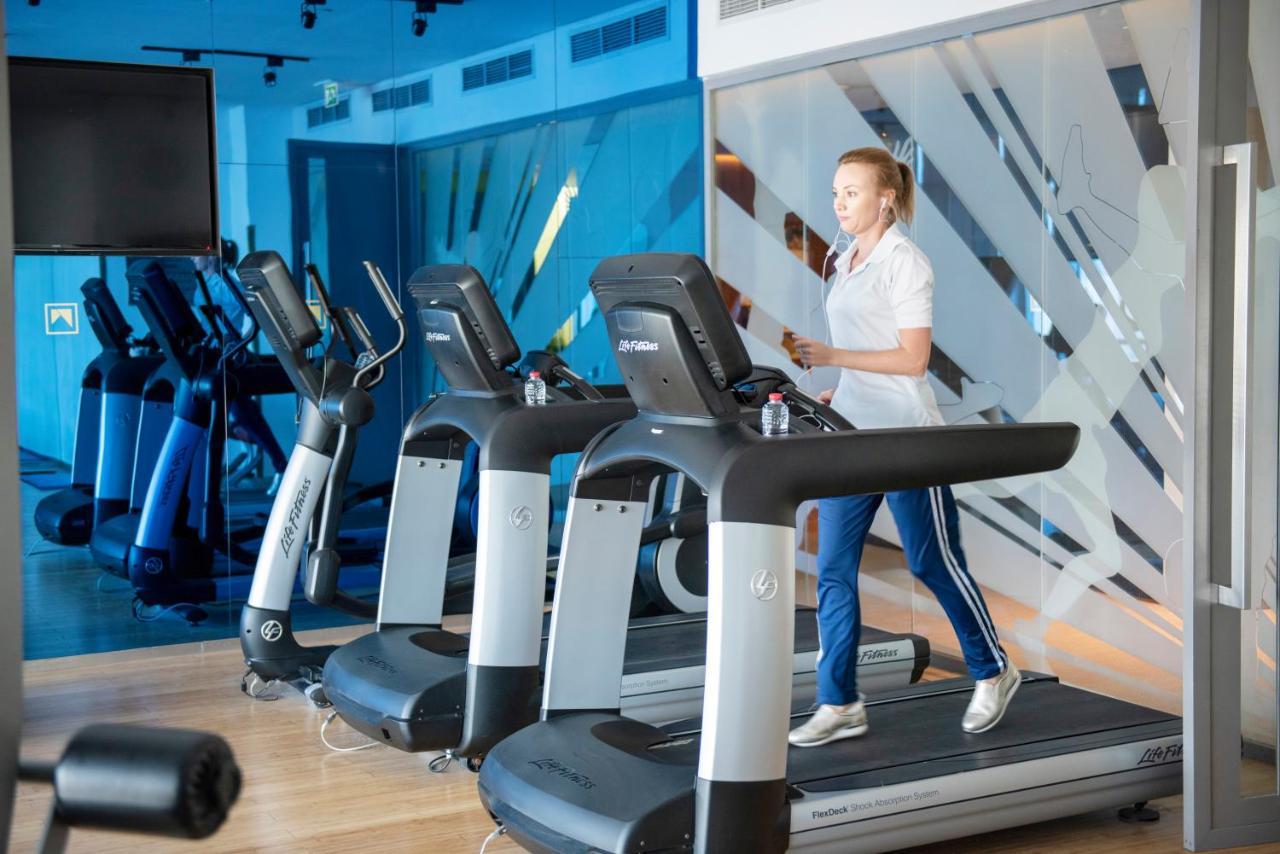 The Act Hotel Sharjah Exterior photo A treadmill