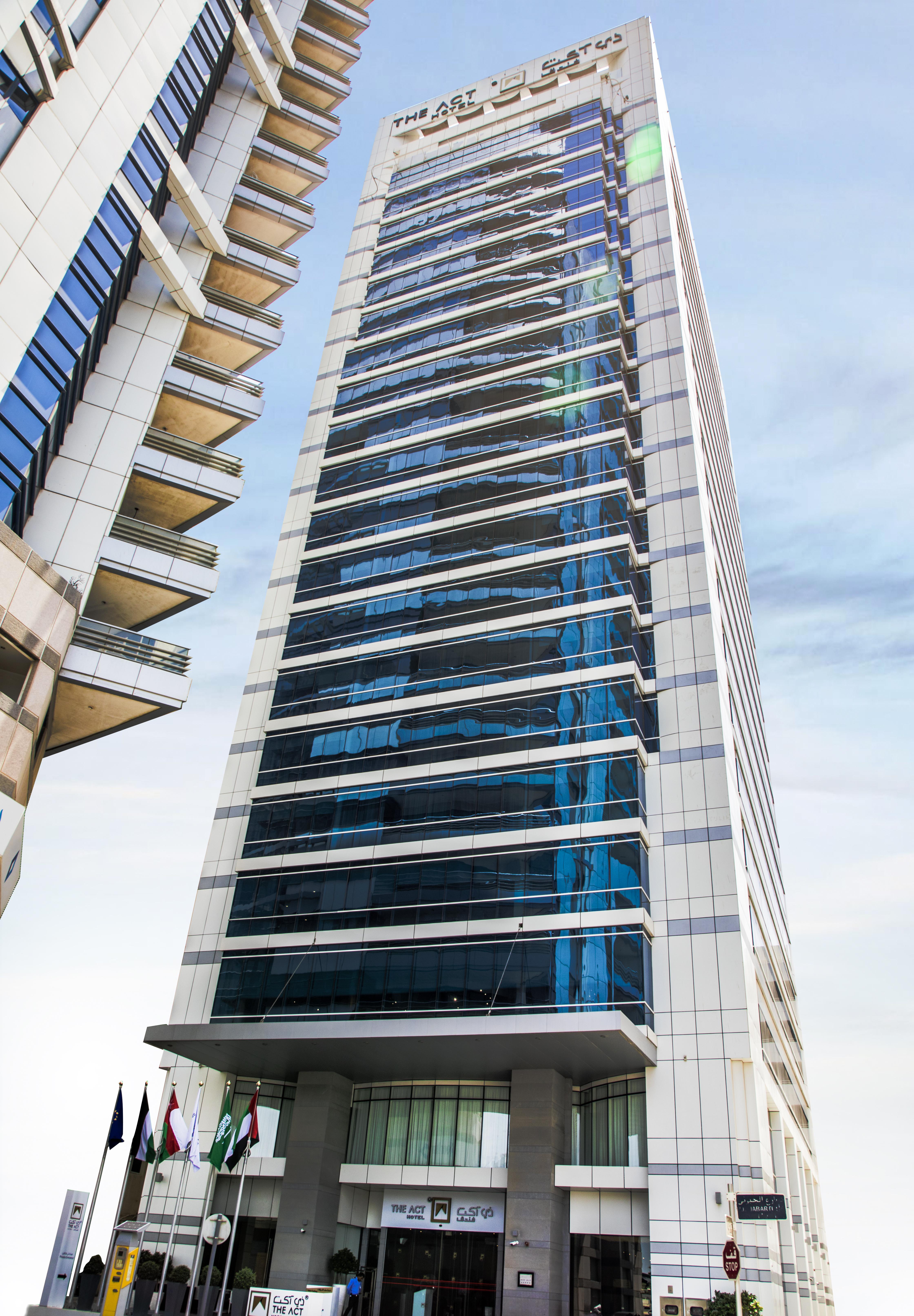 The Act Hotel Sharjah Exterior photo The 100-meter high building of the university