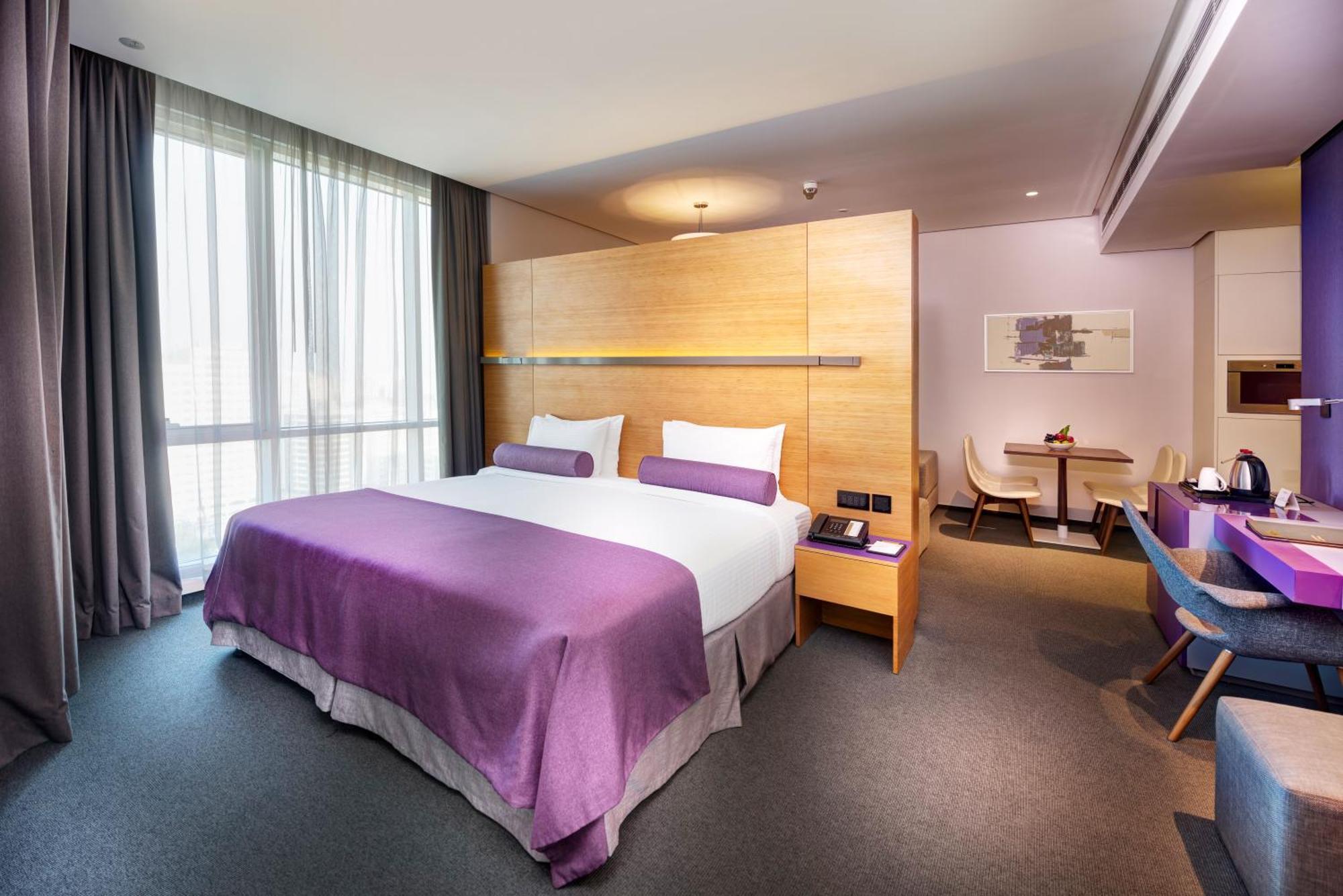 The Act Hotel Sharjah Exterior photo Suite