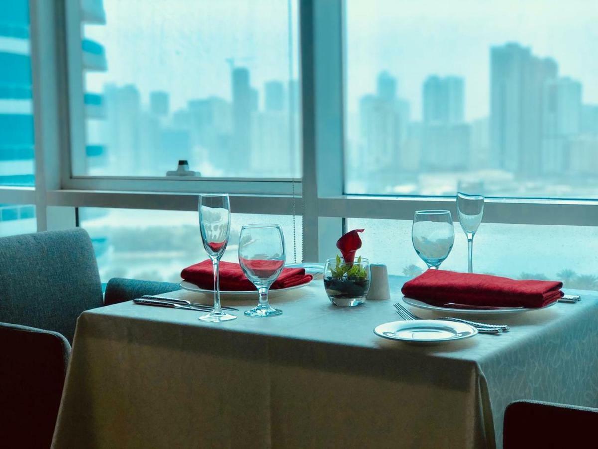 The Act Hotel Sharjah Exterior photo A table set for dinner