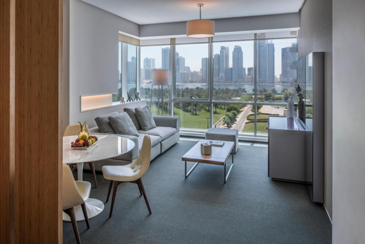 The Act Hotel Sharjah Room photo A living room at The Standard East Village