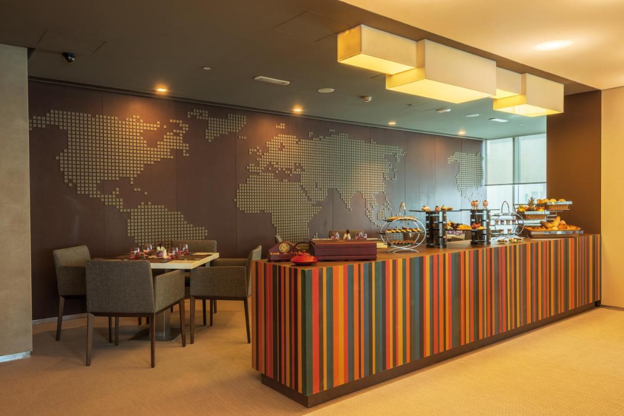 The Act Hotel Sharjah Exterior photo The lounge at the airport