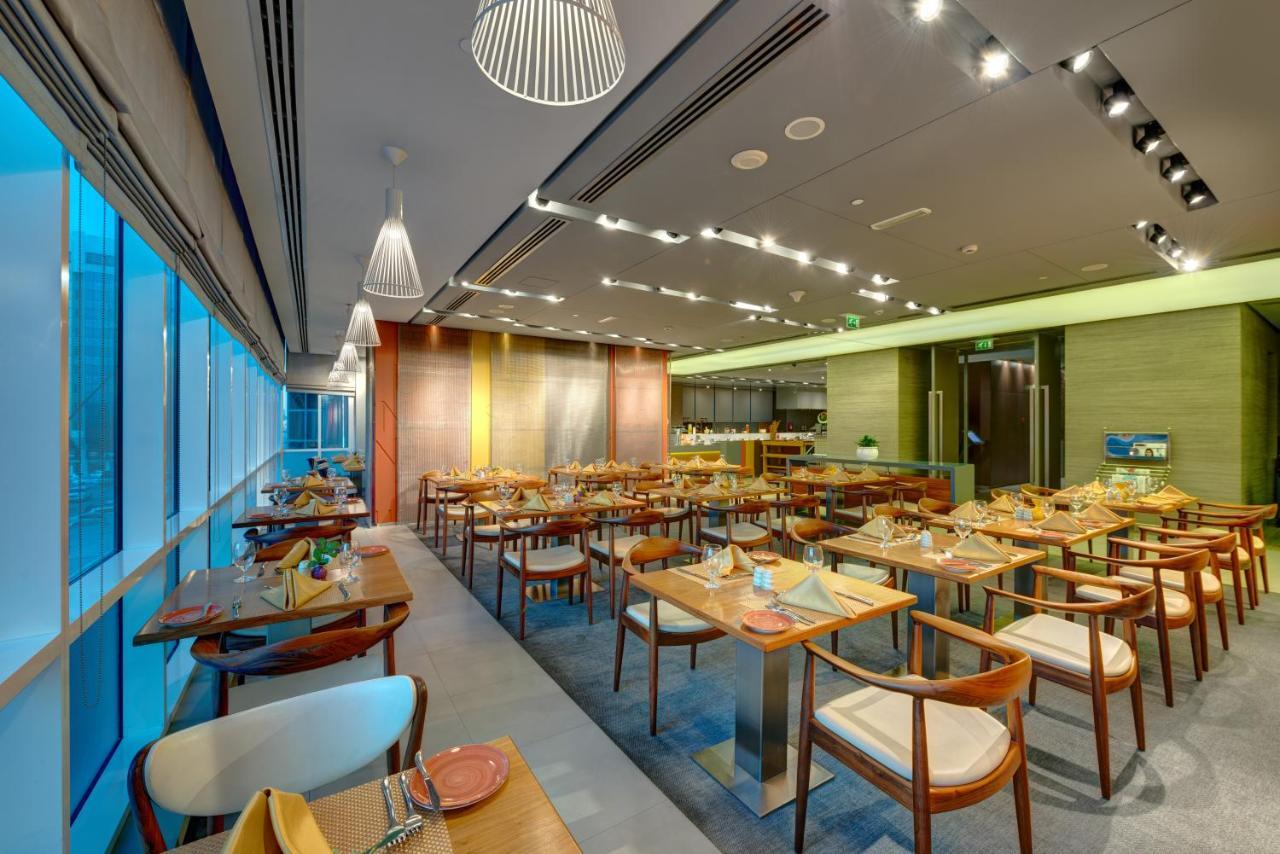 The Act Hotel Sharjah Exterior photo The restaurant