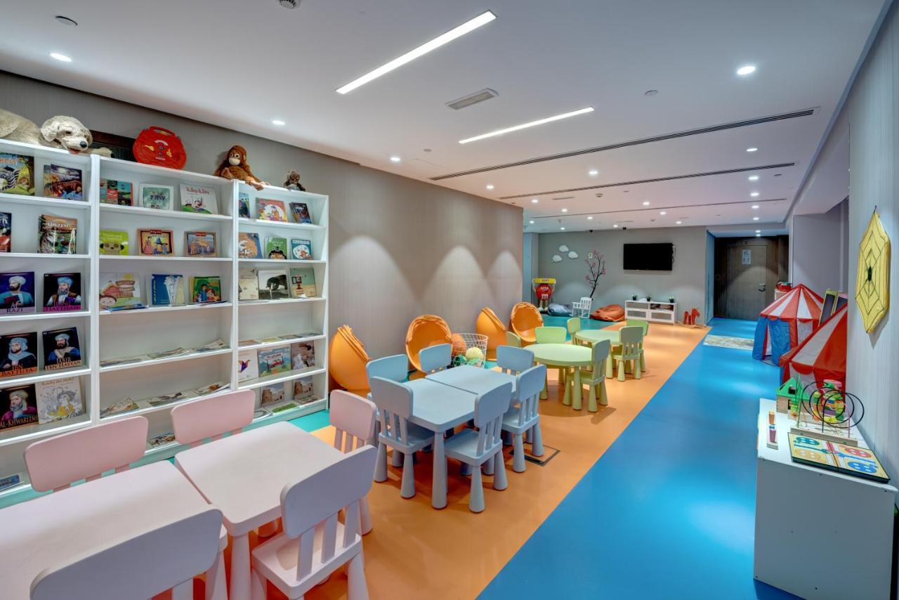 The Act Hotel Sharjah Exterior photo Kids Club