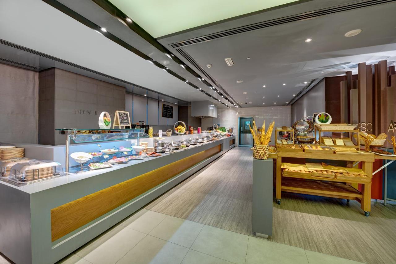 The Act Hotel Sharjah Exterior photo The buffet at the hotel