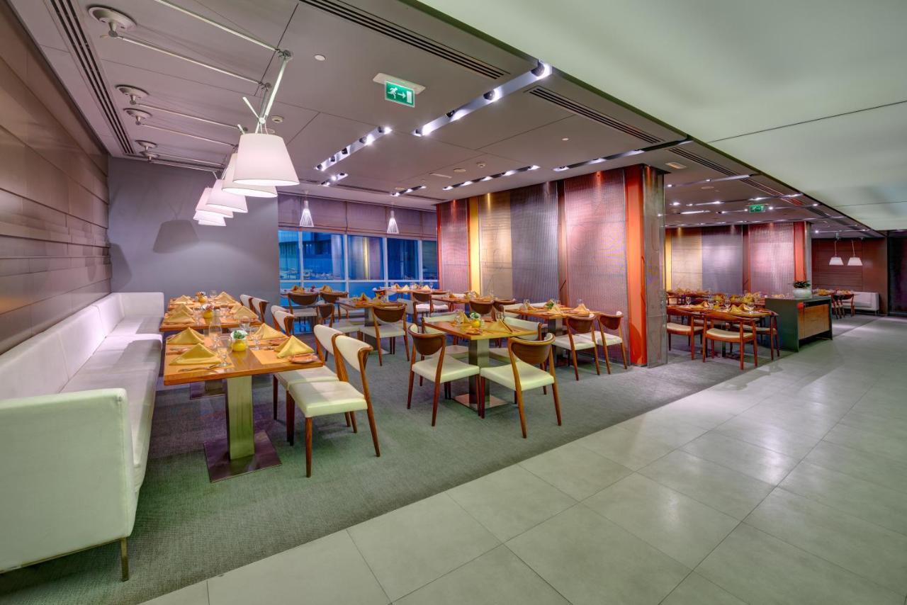 The Act Hotel Sharjah Exterior photo The restaurant
