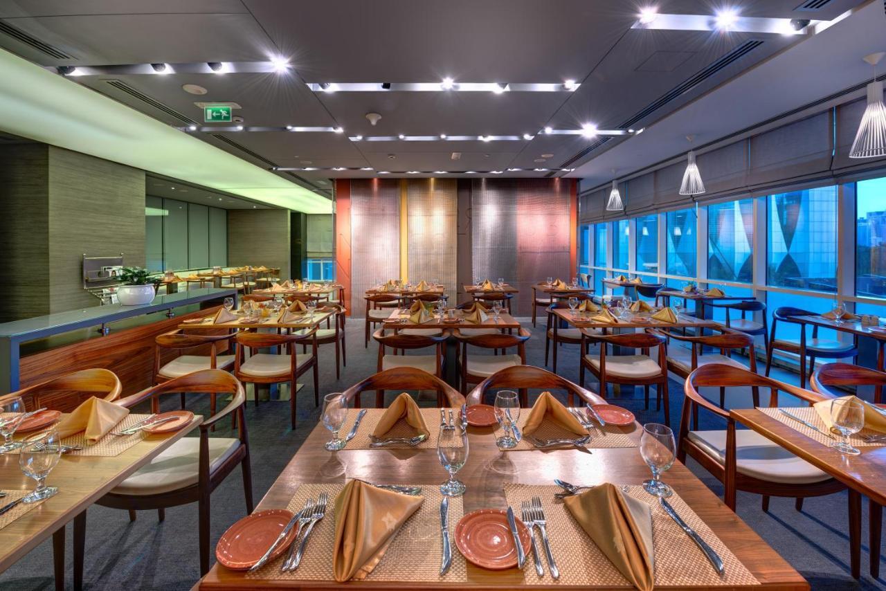 The Act Hotel Sharjah Exterior photo The restaurant