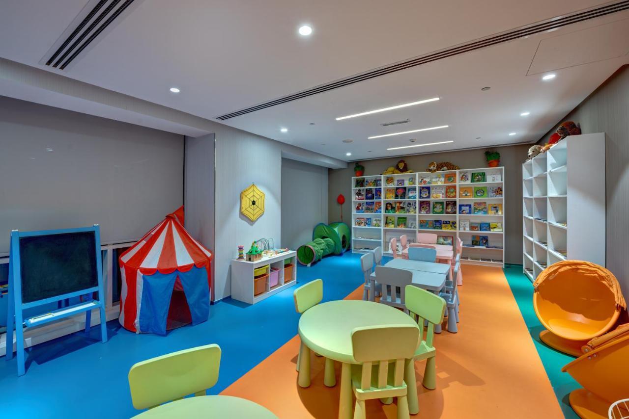 The Act Hotel Sharjah Exterior photo Kids Club