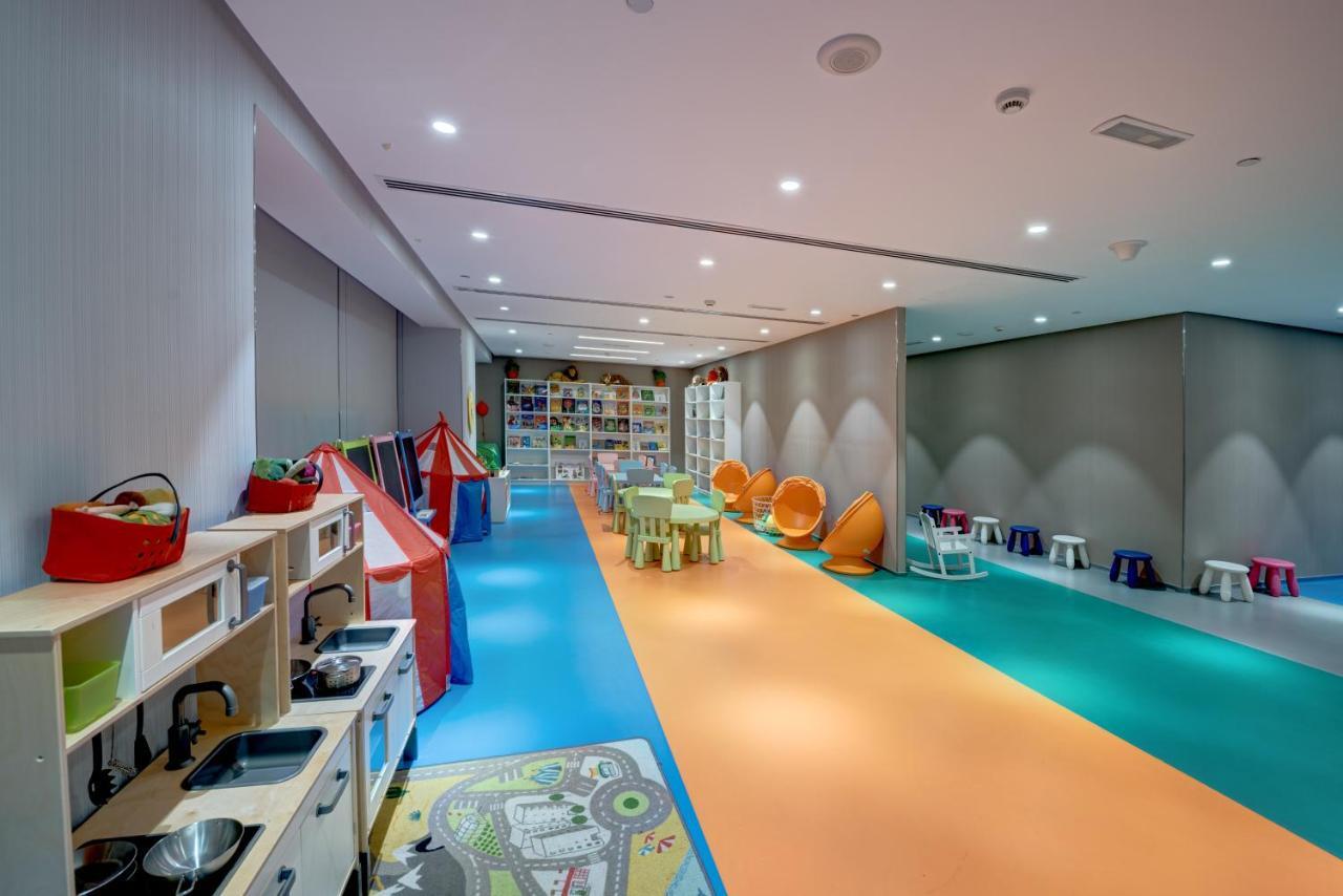 The Act Hotel Sharjah Exterior photo Kids Club