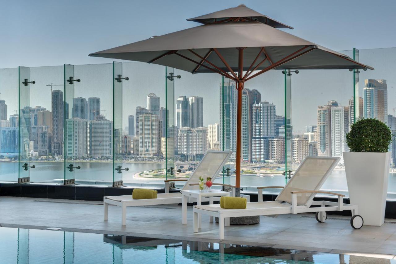 The Act Hotel Sharjah Exterior photo The Address Downtown Dubai